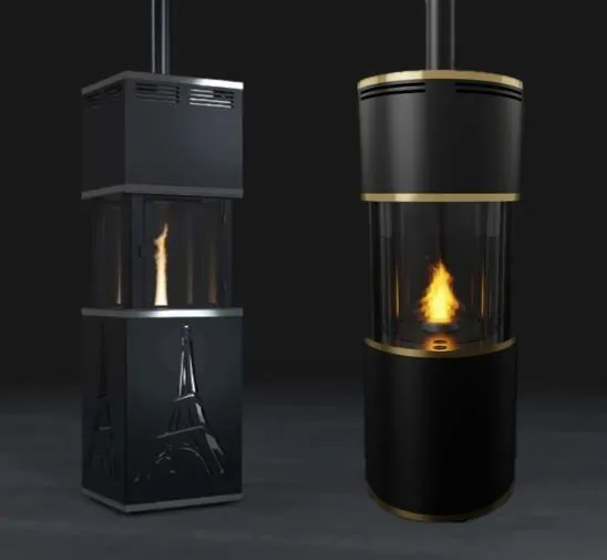 Zwei Schulhof-Vision-Öfen, einer eckig mit Eiffelturm-Motiv, einer rund mit goldenen Zierringen, mit brennender Flamme.